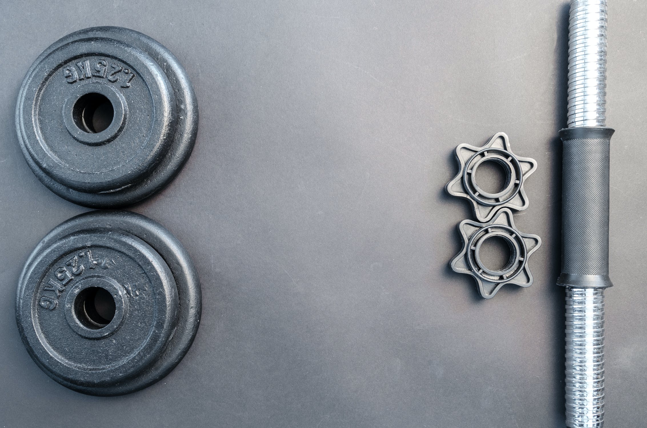 The Best Workout Equipment: Building Strength at Home with Dumbbells and Barbells